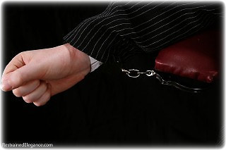 Bondage photo pic picture Fi Stevens handcuffs, blouse, humiliation, topless