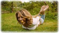 Free bondage photo Alba Zevon rope bondage, ballgag, barefoot, hogtie, blonde, humiliation, jeans, sweater, outdoor, denim