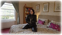 Free bondage photo Temptress Kate barefoot, bedroom, boots, leather bondage, leg irons, straightjacket, metal bondage, outdoor