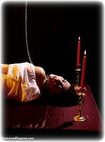 Free bondage photo Angelina barefoot, blouse, chains, metal bondage, shackles