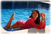 Free bondage photo Elle Tyler barefoot, metal bondage, outdoor