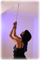 Free bondage photo Myla shoes, chains, cloth gag