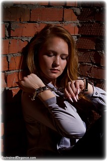 Bondage photo pic picture Irene barefoot, satin, handcuffs, blouse, silk, leg irons, metal bondage, redhead