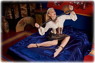 Bondage photo pic picture Ariel Anderssen barefoot, historical, blonde, leg irons, steampunk, medieval, metal bondage, corset, cosplay, ungagged, yoke