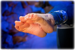 Bondage photo pic picture Charlie Monaco barefoot, jeans, brunette, sweater, tape bondage, tape gag, denim, topless, dungeon