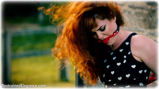 Bondage photo pic picture Zoe Page rope bondage, ballgag, barefoot, outdoor, dress, redhead