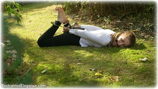 Bondage photo pic picture Stephanie Bonham Carter barefoot, handcuffs, blonde, blouse, hogtie, jodhpurs, leg irons, metal bondage, outdoor