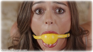 Bondage photo pic picture Lauren Rice ballgag, bedroom, handcuffs, hogtie, brunette, sportswear, leg irons