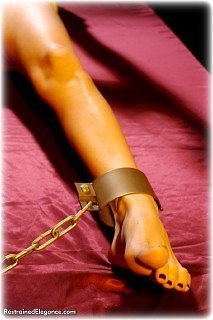 Bondage photo pic picture Angelina barefoot, blouse, chains, metal bondage, shackles