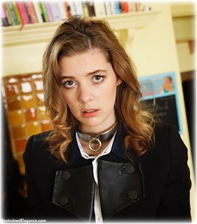 Bondage photo pic picture Aria Wednesday barefoot, handcuffs, blouse, shackles, skirt, leg irons, chains, melodrama, metal bondage, collar, corporal punishment, nude, ungagged, uniform, riding crop