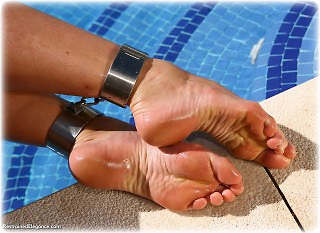 Bondage photo pic picture Ariel Anderssen ballgown, barefoot, satin, shackles, silk, leg irons, metal bondage, outdoor