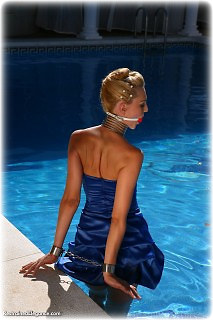 Bondage photo pic picture Ariel Anderssen ballgown, barefoot, satin, shackles, silk, leg irons, metal bondage, outdoor