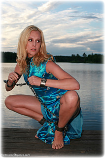 Bondage photo pic picture Ariel Anderssen barefoot, shackles, leg irons, chains, chinese dress, metal bondage, collar, outdoor