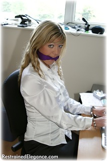 Bondage photo pic picture Belle barefoot, satin, handcuffs, blouse, silk, skirt, leg irons, cloth gag, metal bondage, topless, pencil skirt