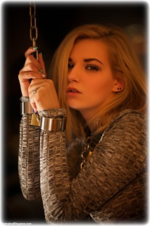 Bondage photo pic picture Bad Dolly barefoot, blonde, shackles, sm factory, leg irons, chains, collar, dress, ungagged