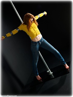 Bondage photo pic picture Helen Stephens barefoot, bondage pole, bondage tape, jeans, sweater, tape gag, ungagged, redhead