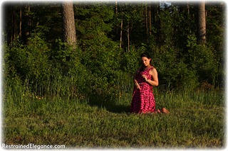 Bondage photo pic picture Temptress Kate barefoot, handcuffs, brunette, leg irons, metal bondage, outdoor, dress, ungagged