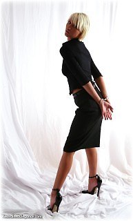 Bondage photo pic picture Katie Lee barefoot, handcuffs, blouse, shoes, leg irons