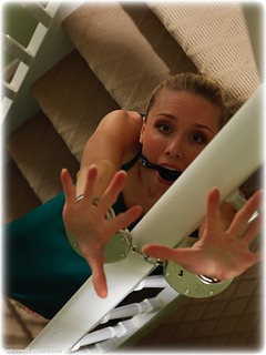Bondage photo pic picture Katy Cee ballgag, ballgown, barefoot, gown, satin, handcuffs, blonde, silk, leg irons, metal bondage, dress, topless, ungagged