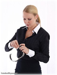 Bondage photo pic picture Missey blouse, humiliation, shackles, shoes, cane, leg irons, slave training, spanking, stockings, metal bondage, collar, corporal punishment