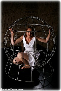 Bondage photo pic picture Pling rope bondage, rope gag, barefoot, cage, dress, ungagged